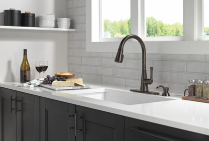 Delta Alpen Single Handle Pull-Down Kitchen Faucet with Soap Dispenser and ShieldSpray® Technology in Venetian Bronze